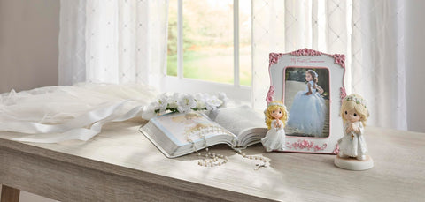 Precious Moments gift ready packaging makes a thoughtful First Communion keepsake.