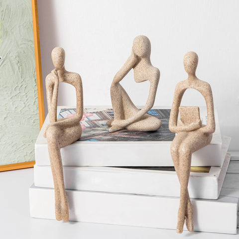 Prettidecor gold thinker statue on shelf for modern elegance