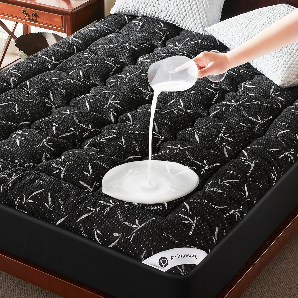 Primesoft waterproof king-size topper keeps the mattress dry.
