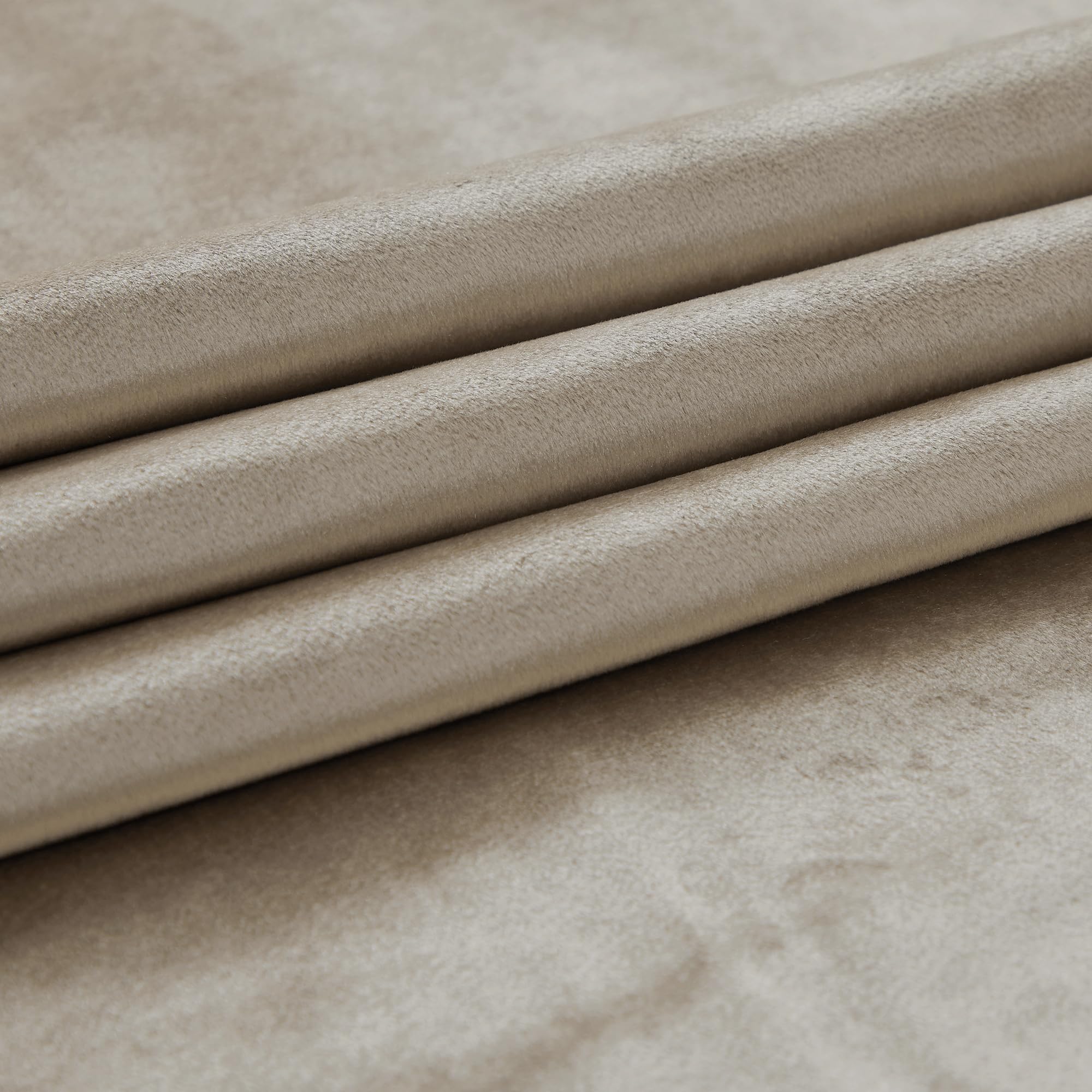PRIMROSE Taupe velvet curtains highlighting potential energy savings through insulation.