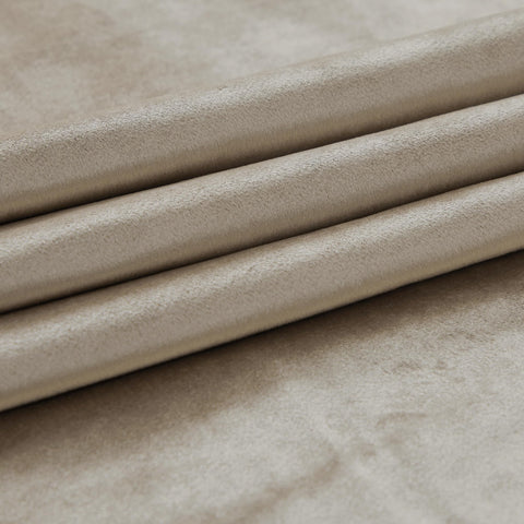 PRIMROSE Taupe velvet curtains highlighting potential energy savings through insulation.