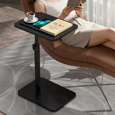 Adjustable height and angle desk improves couch comfort.