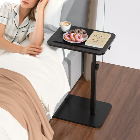 Promitop table with built-in tablet slot for hands-free entertainment.