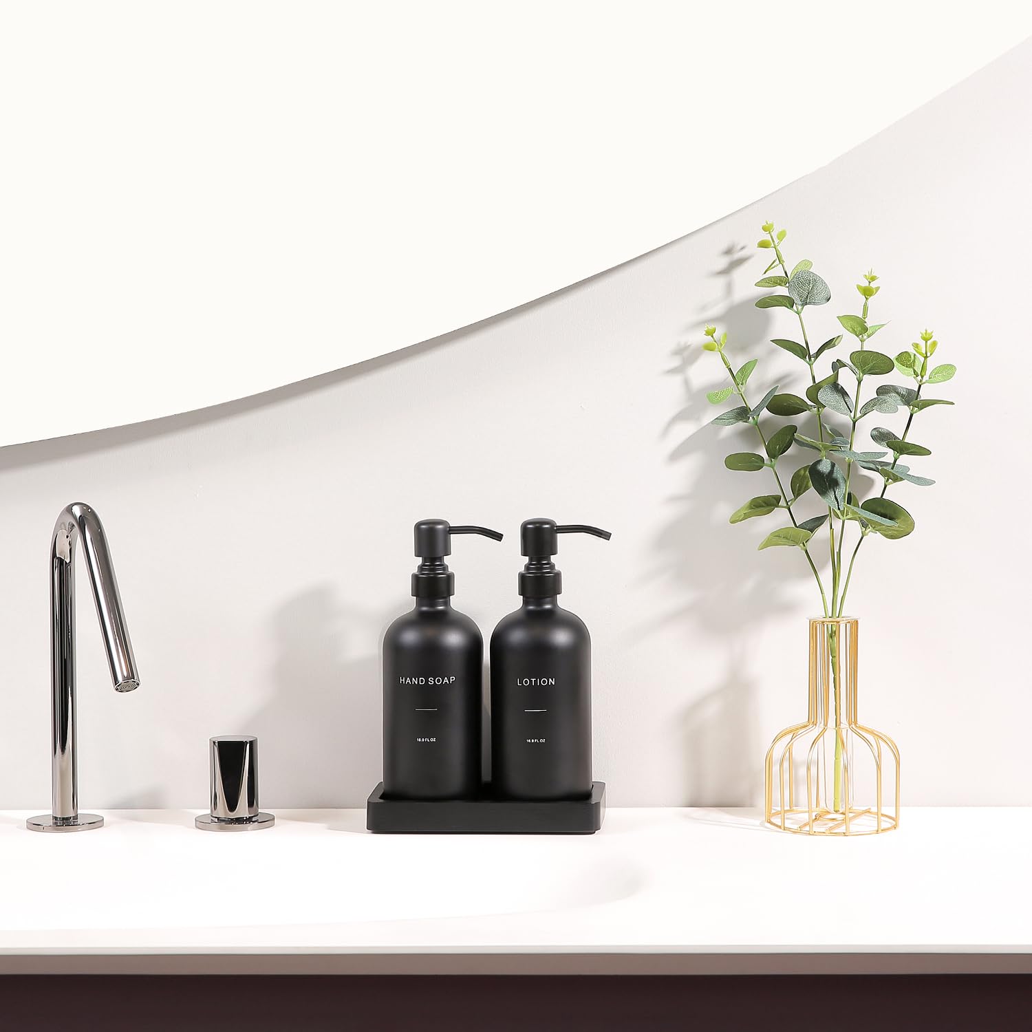Prus Waso black dispenser tray with anti-slip base keeps counters stable.