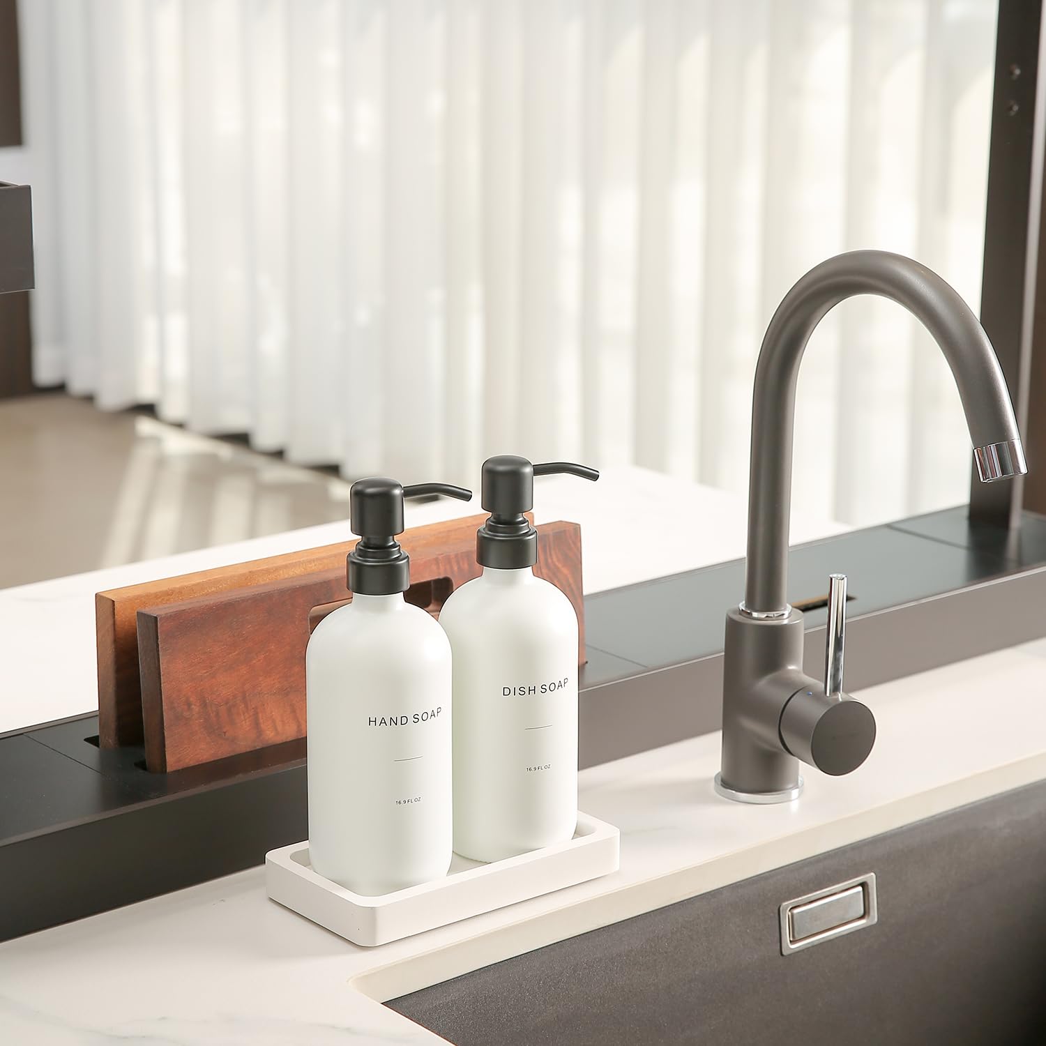 Prus Waso kitchen soap dispenser with black pump detail adds durable, easy-to-use functionality.