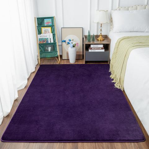 Przemy rug highlights memory foam core for cloud-like softness.