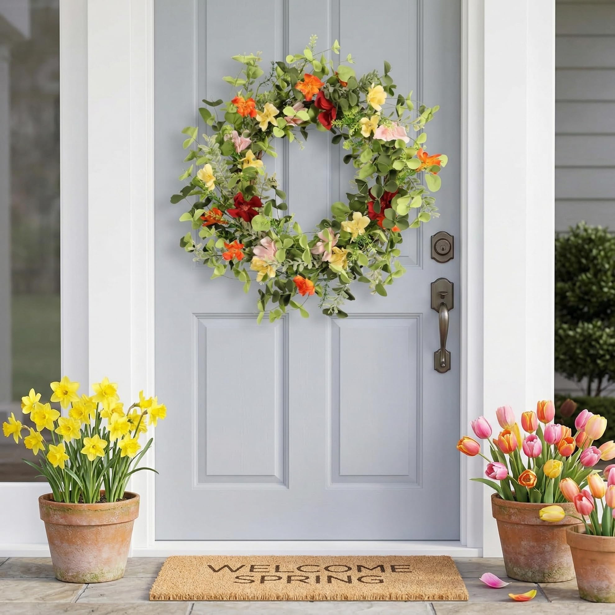 Pudate 22in wreath features berry accents for texture and warmth.