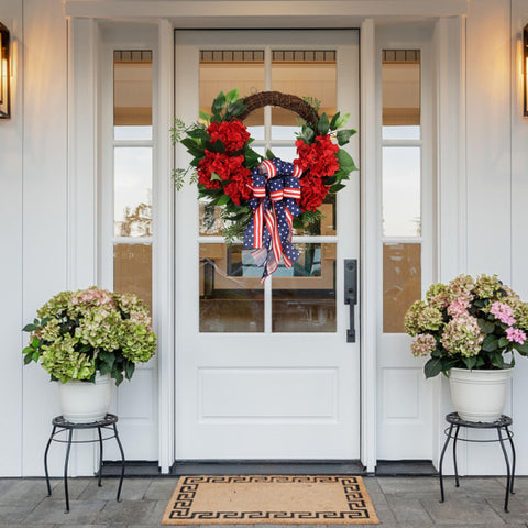 Pudate ivy and hydrangea wreath adds lush greenery to any wall.