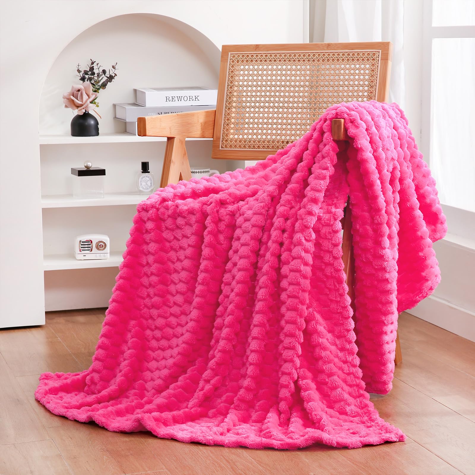 Puncuntex hot pink throw blanket with 3D jacquard elevates home decor.