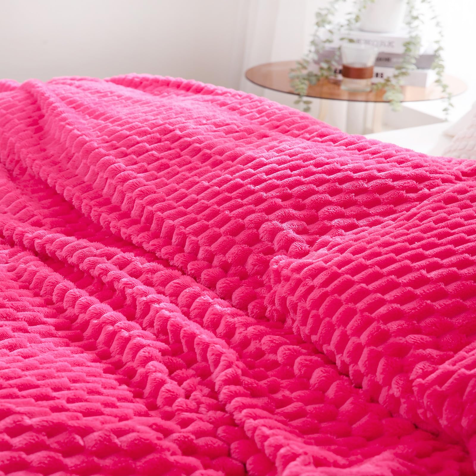 Puncuntex hot pink throw makes a gift-ready home accent.