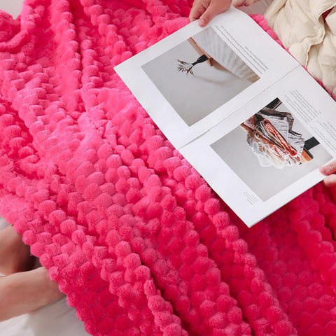 Puncuntex hot pink throw blanket feels soft and lightweight.