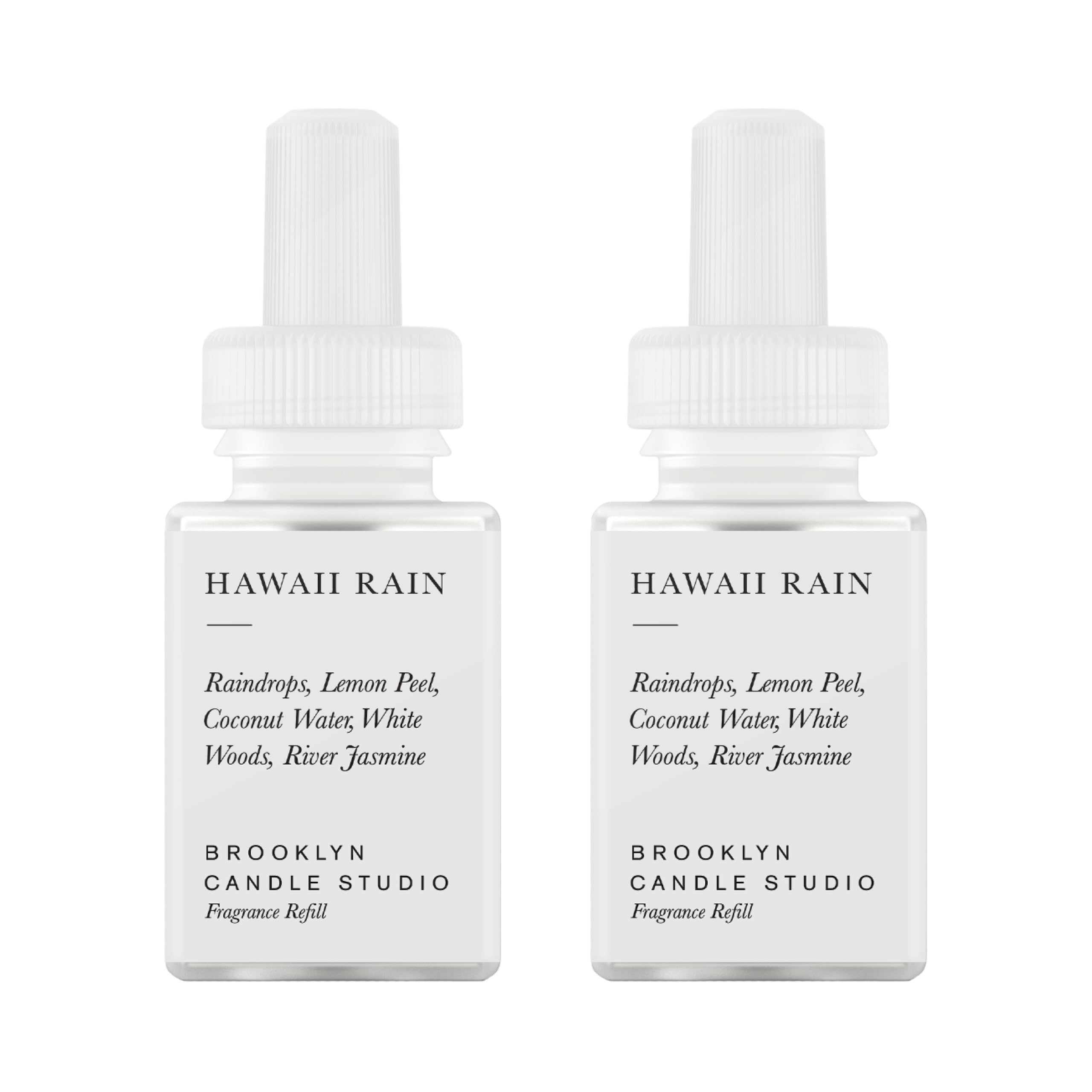 Pura Hawaii Rain refill bottle ready for Brooklyn diffuser system, showcasing long-lasting fragrance.