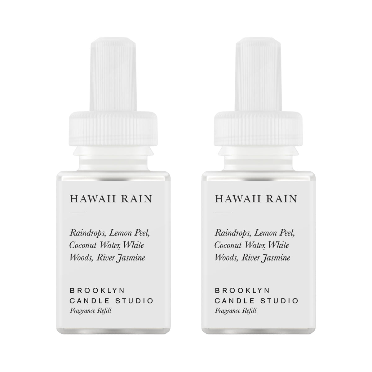 Pura Hawaii Rain refill bottle ready for Brooklyn diffuser system, showcasing long-lasting fragrance.