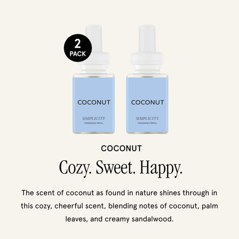 Pura Coconut refill bottle close-up reveals coconut and sandalwood hints for luxury ambience.