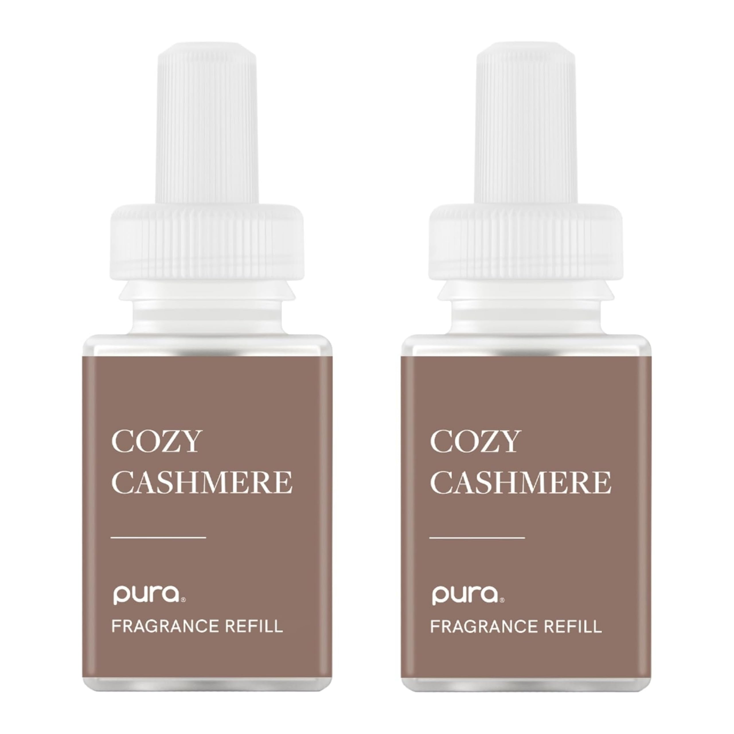 Pura Cozy Cashmere bottle showcasing warm coconut-vanilla-sandalwood notes.