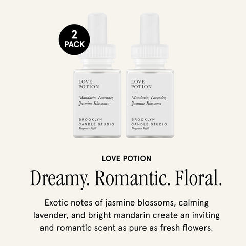 Pura Love Potion bottle close-up with jasmine, lavender, and mandarin notes.