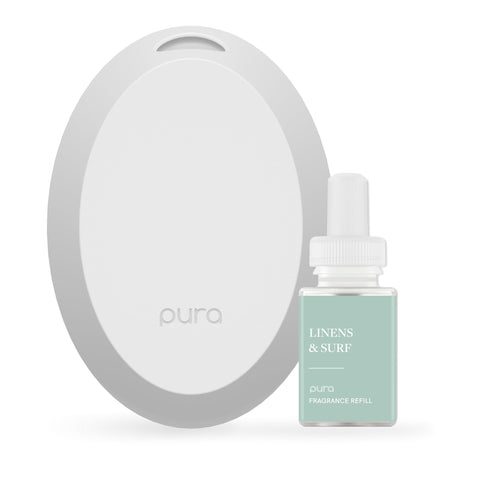 Pura Mini diffuser on a nightstand with a soft LED glow for ambient fragrance