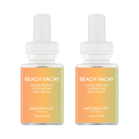 Pura Moodcast refill bottle displaying tropical notes for a vibrant home scent