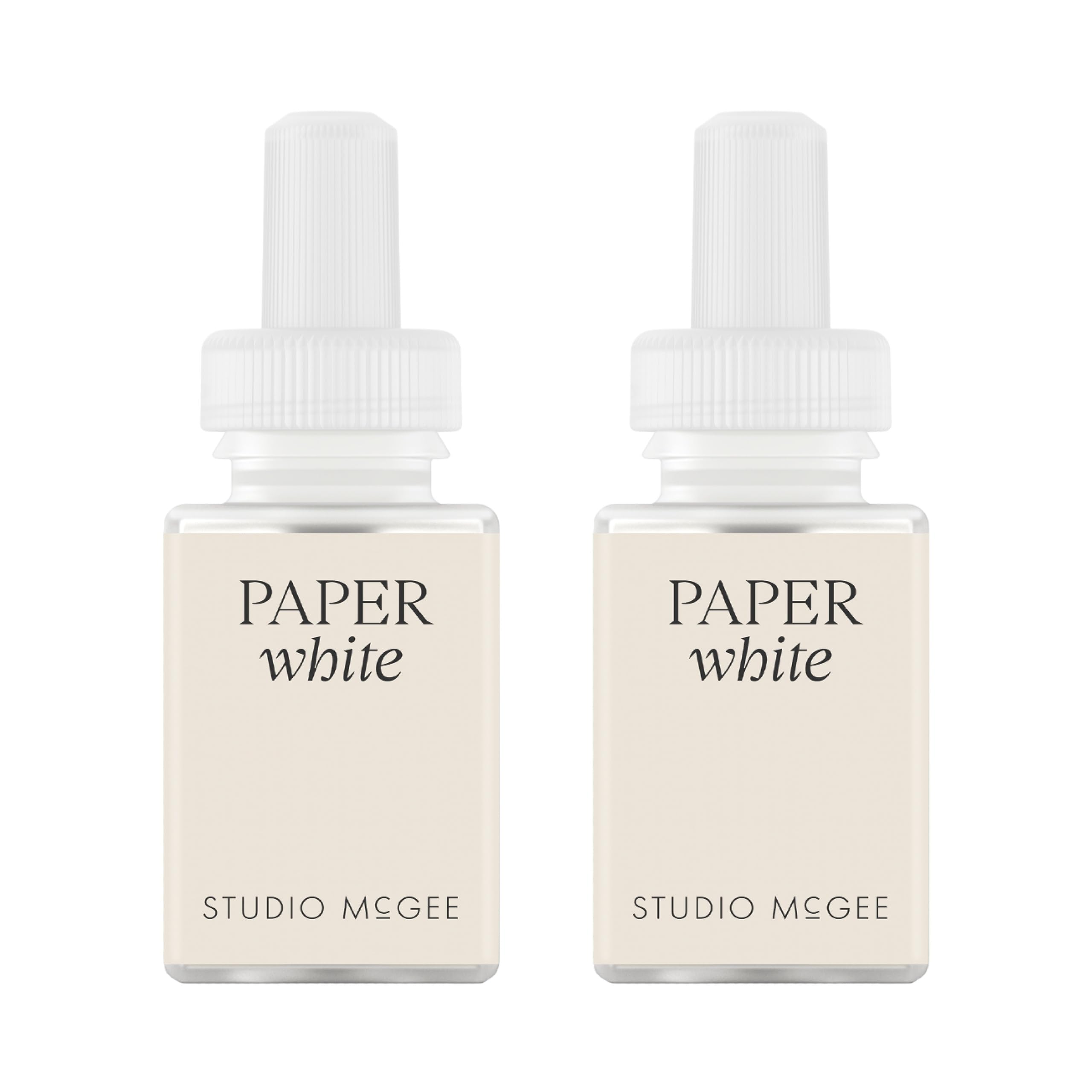 Pura Paper White refill bottle with cotton and amber notes elevates contemporary spaces for a clean, inviting atmosphere.