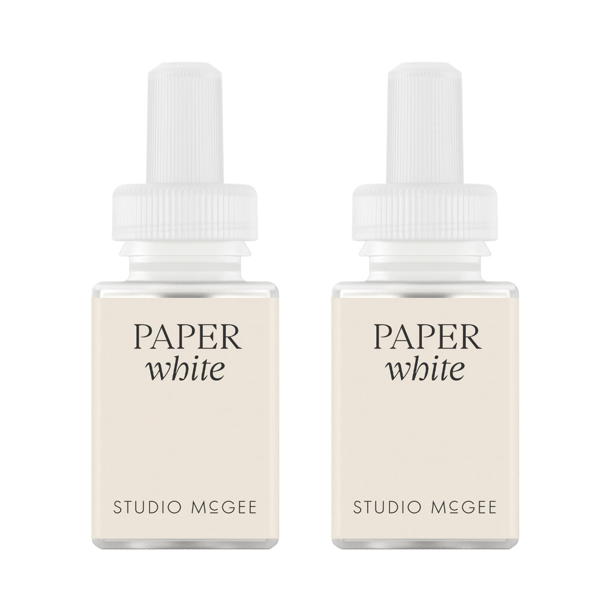 Pura Paper White refill bottle with cotton and amber notes elevates contemporary spaces for a clean, inviting atmosphere.
