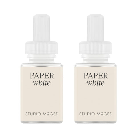 Pura Paper White refill bottle with cotton and amber notes elevates contemporary spaces for a clean, inviting atmosphere.