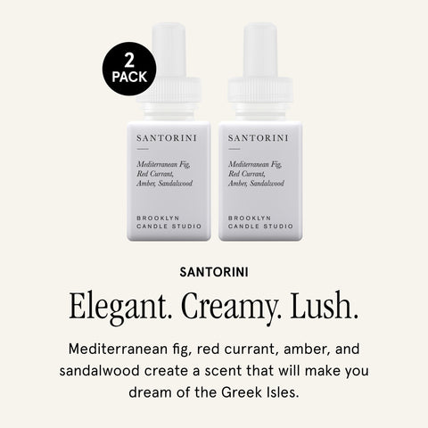 Pura Santorini diffuser vial close-up shows premium fragrance notes