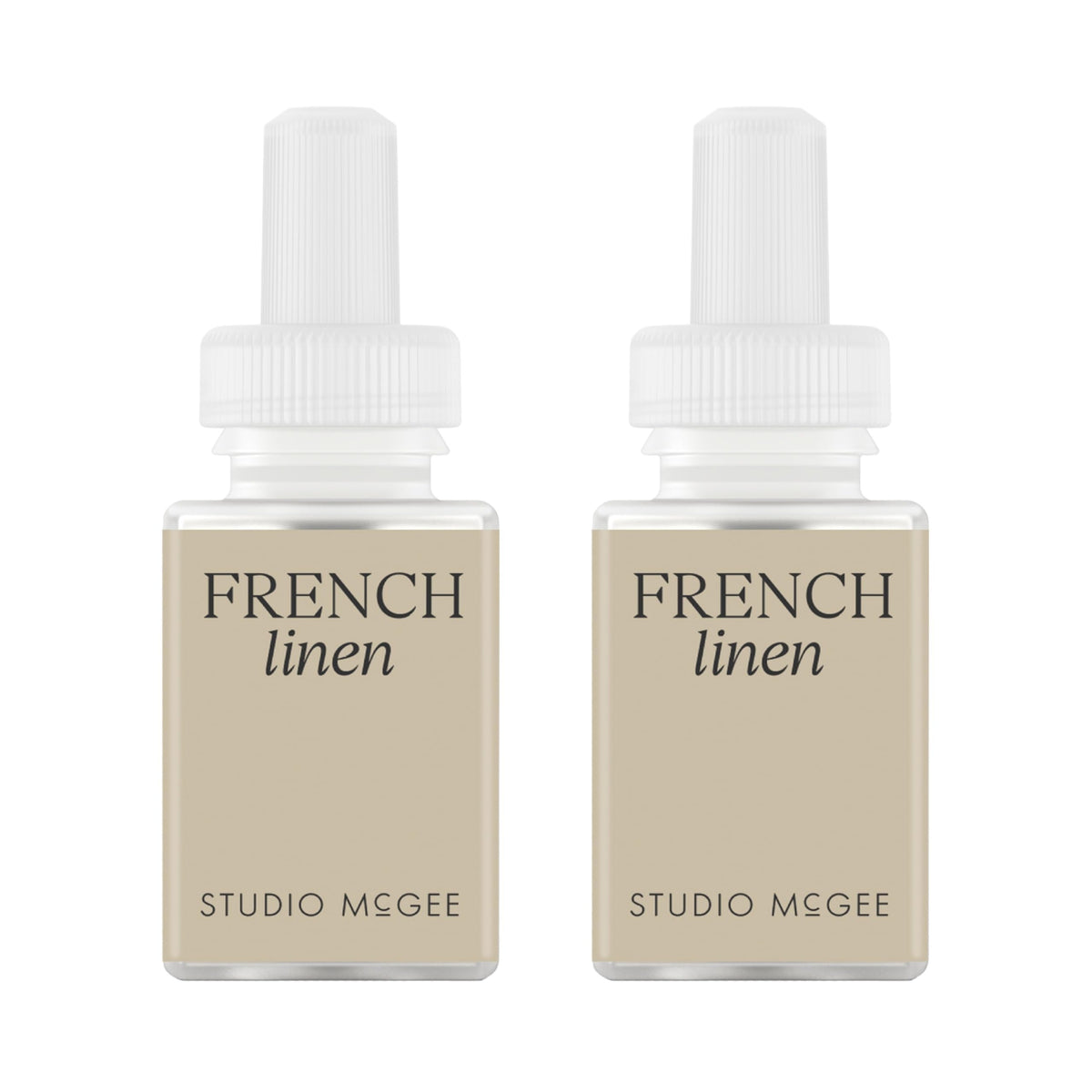 Pura Studio McGee French Linen refill bottle enhances ambiance with a calm, refined aroma.