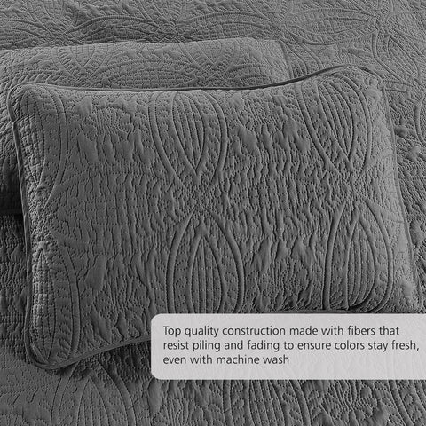 Pure Bedding King quilt slightly folded highlighting lightweight all-season design.