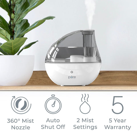 MistAire Silver in a bedroom setup providing restful atmosphere with soft light and quiet operation.