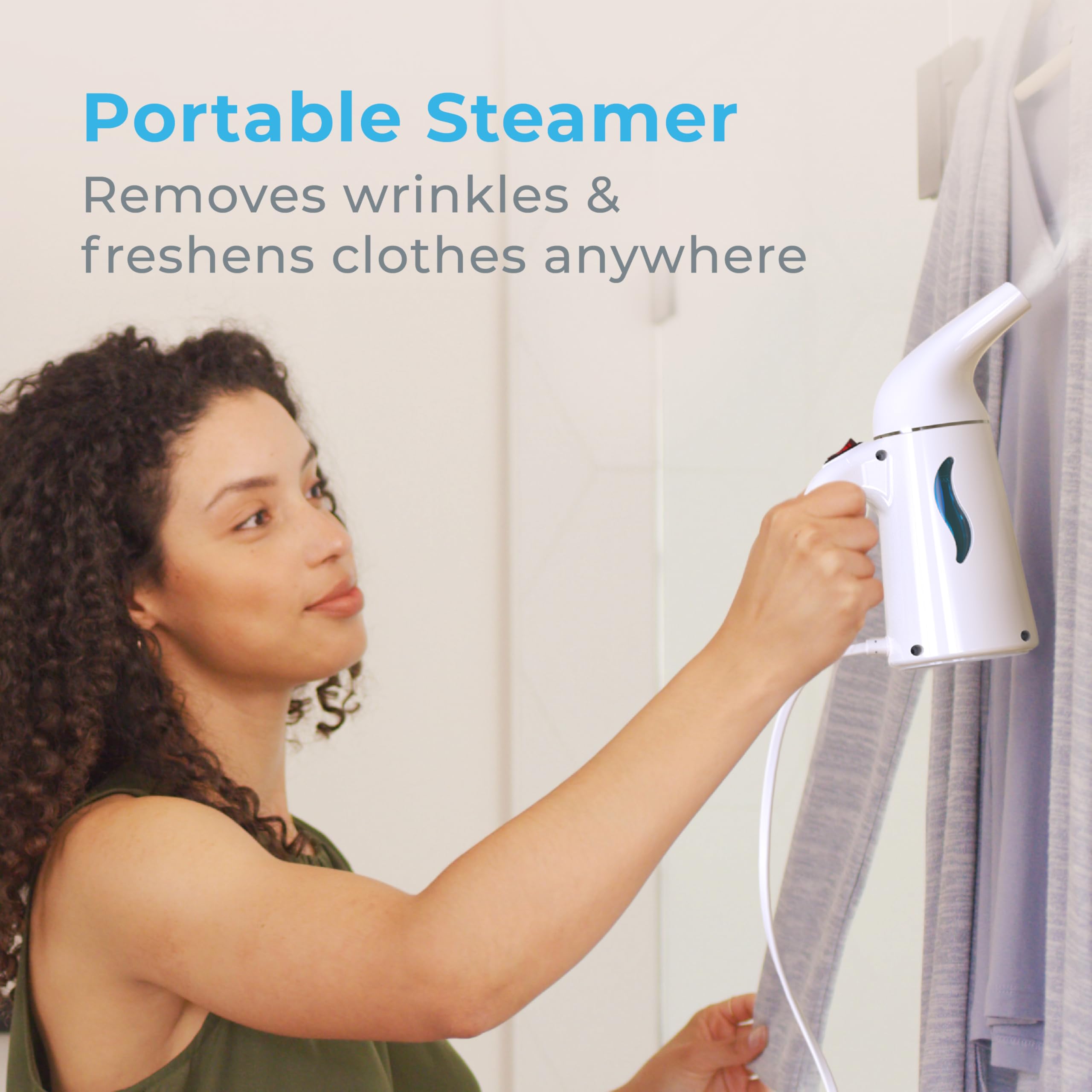 Pure Enrichment PureSteam handheld-use demonstrates travel-friendly wrinkle removal on the go.