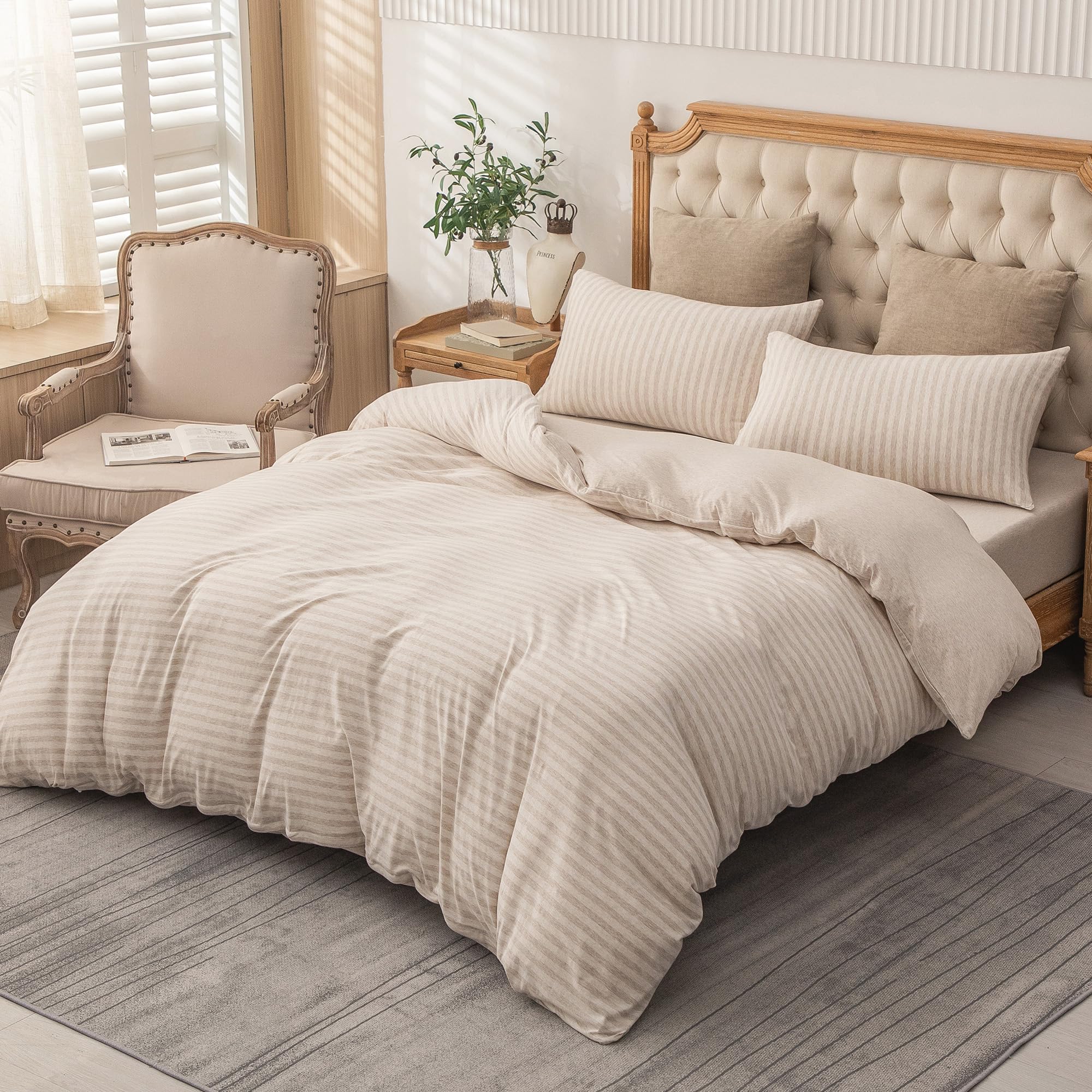 PURE ERA heathered beige stripe fabric detail emphasizing soft jersey finish