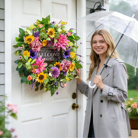 PureCosy front door wreath with welcome sign greets guests.