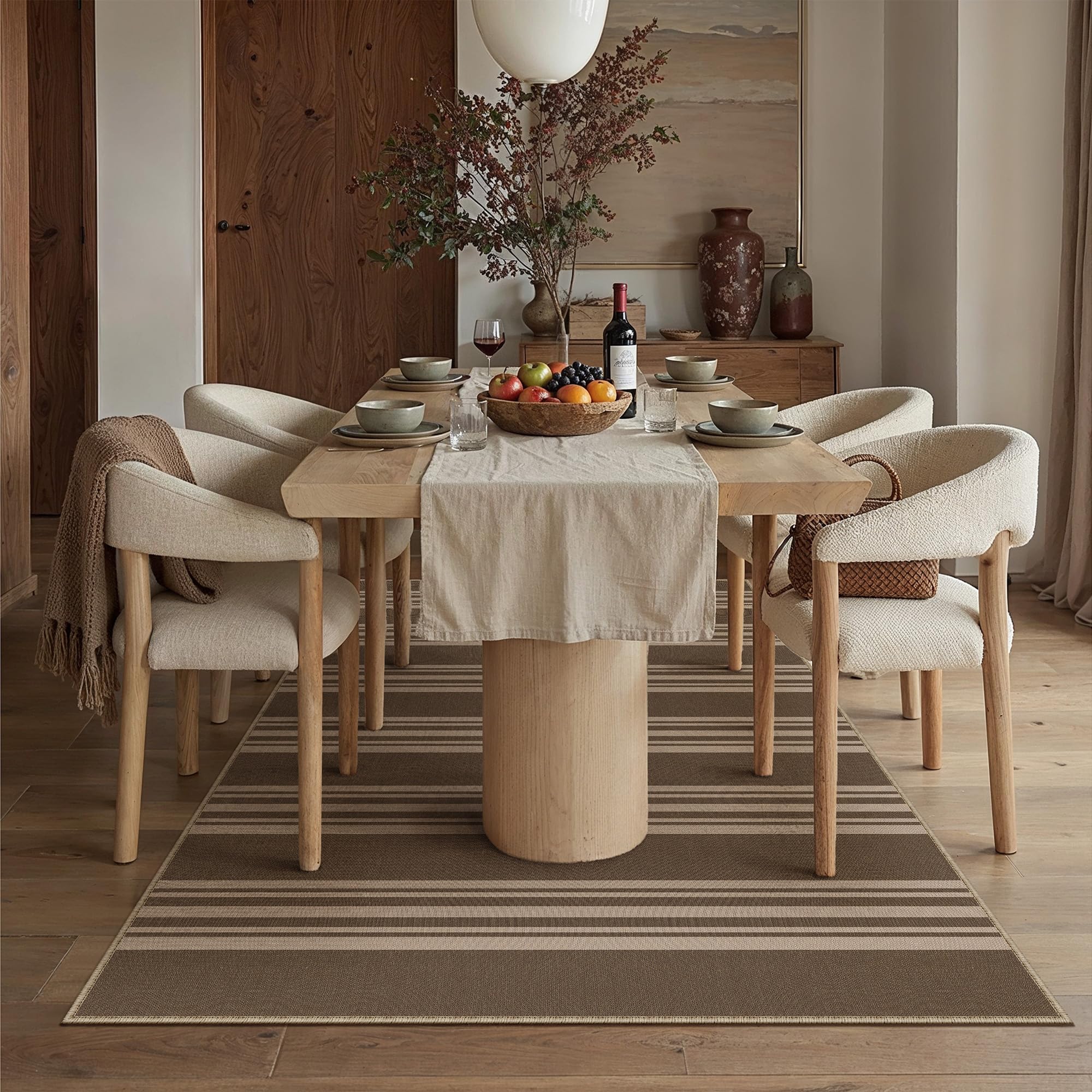 PureCozy striped easy jute 5x7 rug in dining room anchors seating with neutral, modern farmhouse vibe.