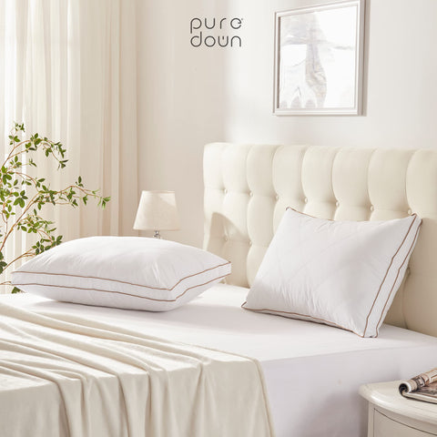 Puredown care-instruction pillow-wash-dry explains cold wash and low tumble dry.