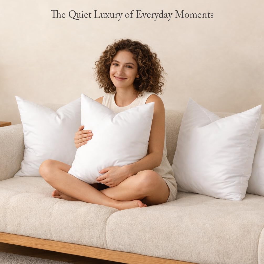 Puredown pillow inserts being fluffed to achieve full magazine-worthy plump.