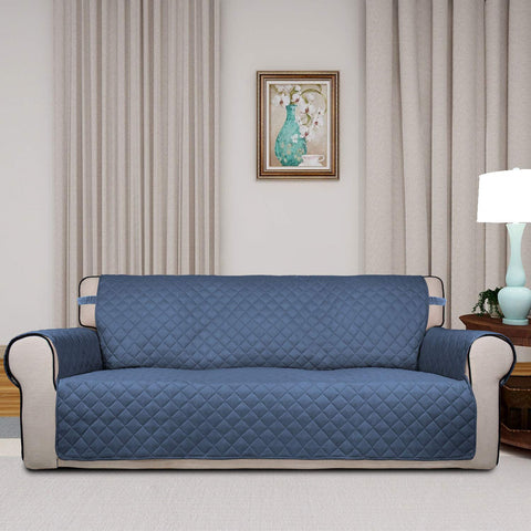 PureFit Reversible Quilted Sofa Cover in light blue protects from spills