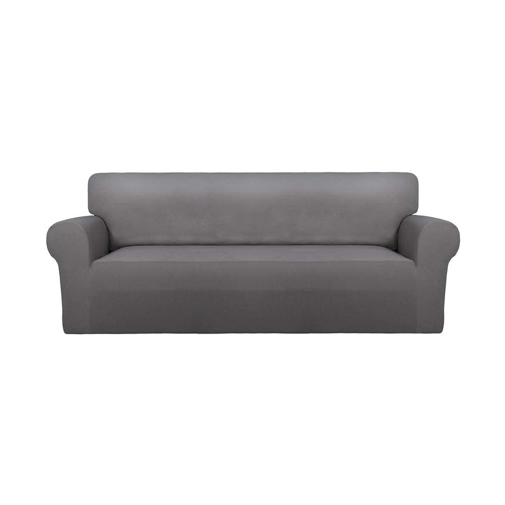 PureFit Super Stretch slipcover in light gray fits many sofas and protects against wear.