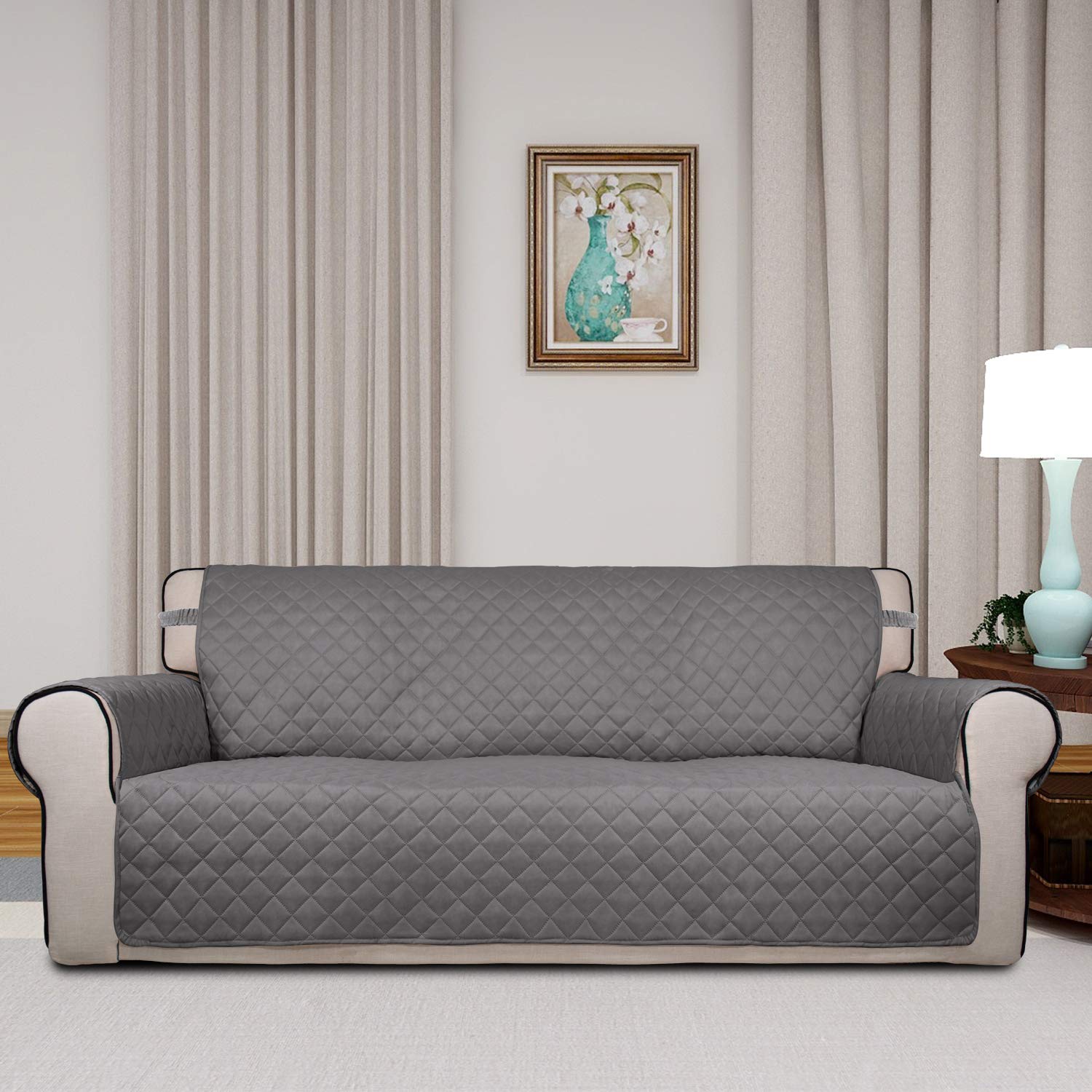 PureFit water-resistant sofa cover corner view demonstrates spill protection for pets and kids.