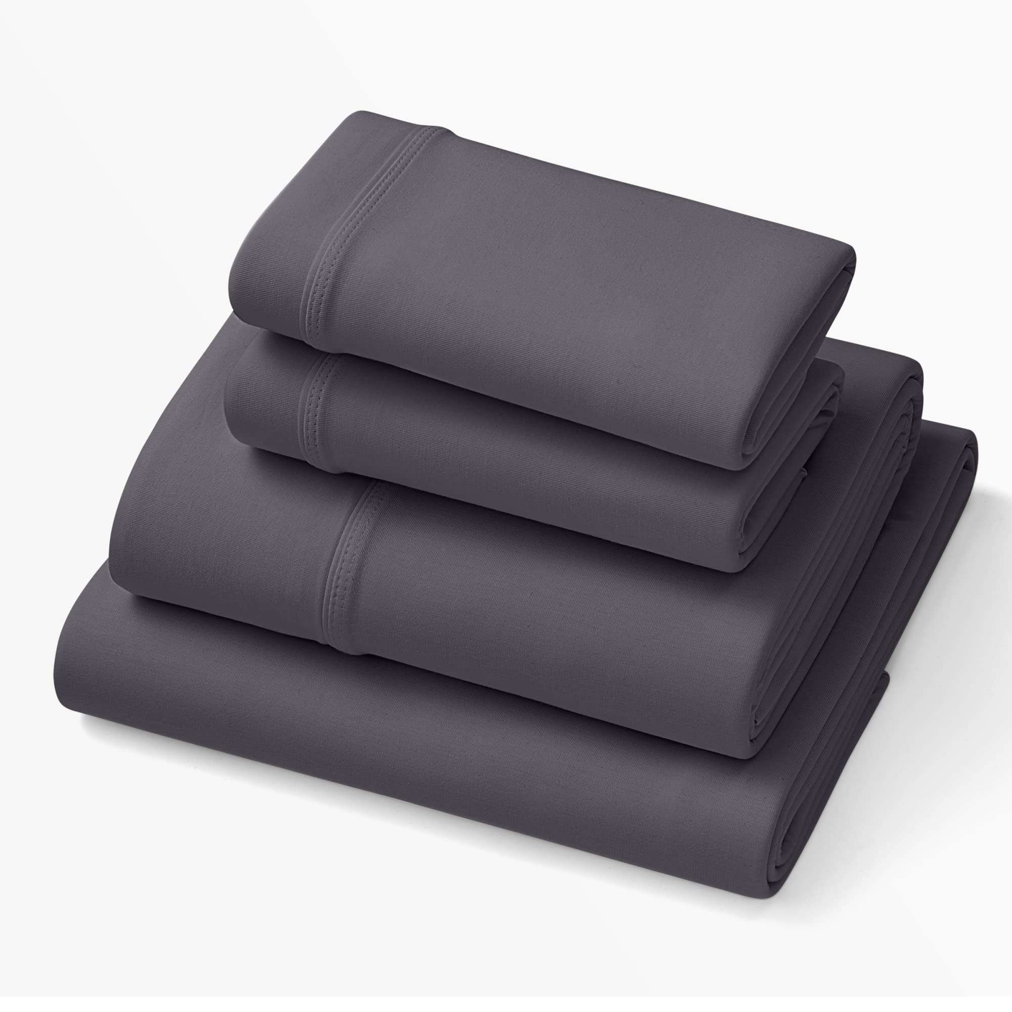 Purple SoftStretch sheets in stormy grey on bed show adaptive fit
