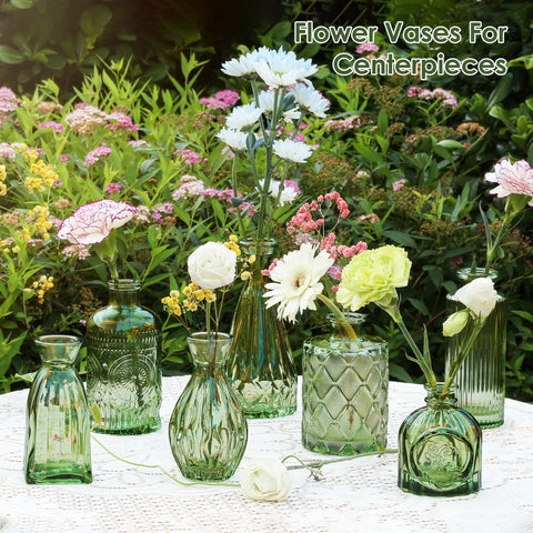 Purvonnie amber mini vase set highlights textured shine on dining tables.