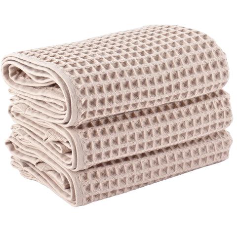PÜSKÜL beige waffle towels set of three for bath and kitchen.