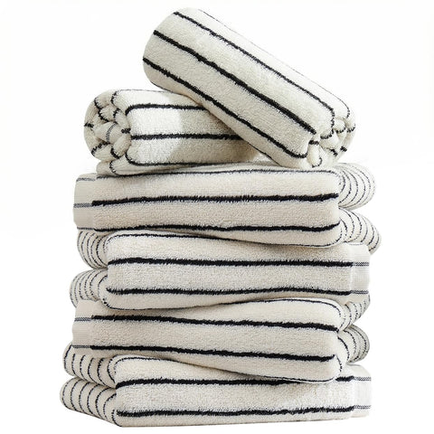 Qaxopl stripe towels draped on rack show compact, absorbent design for quick hand drying.