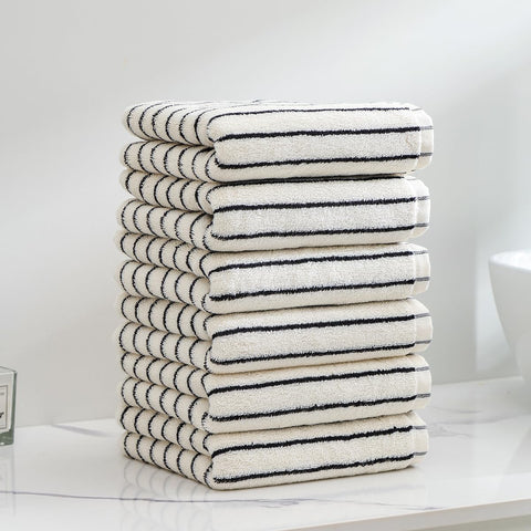 Qaxopl stripe towels hanging on bar illustrate easy reach and space-saving storage.
