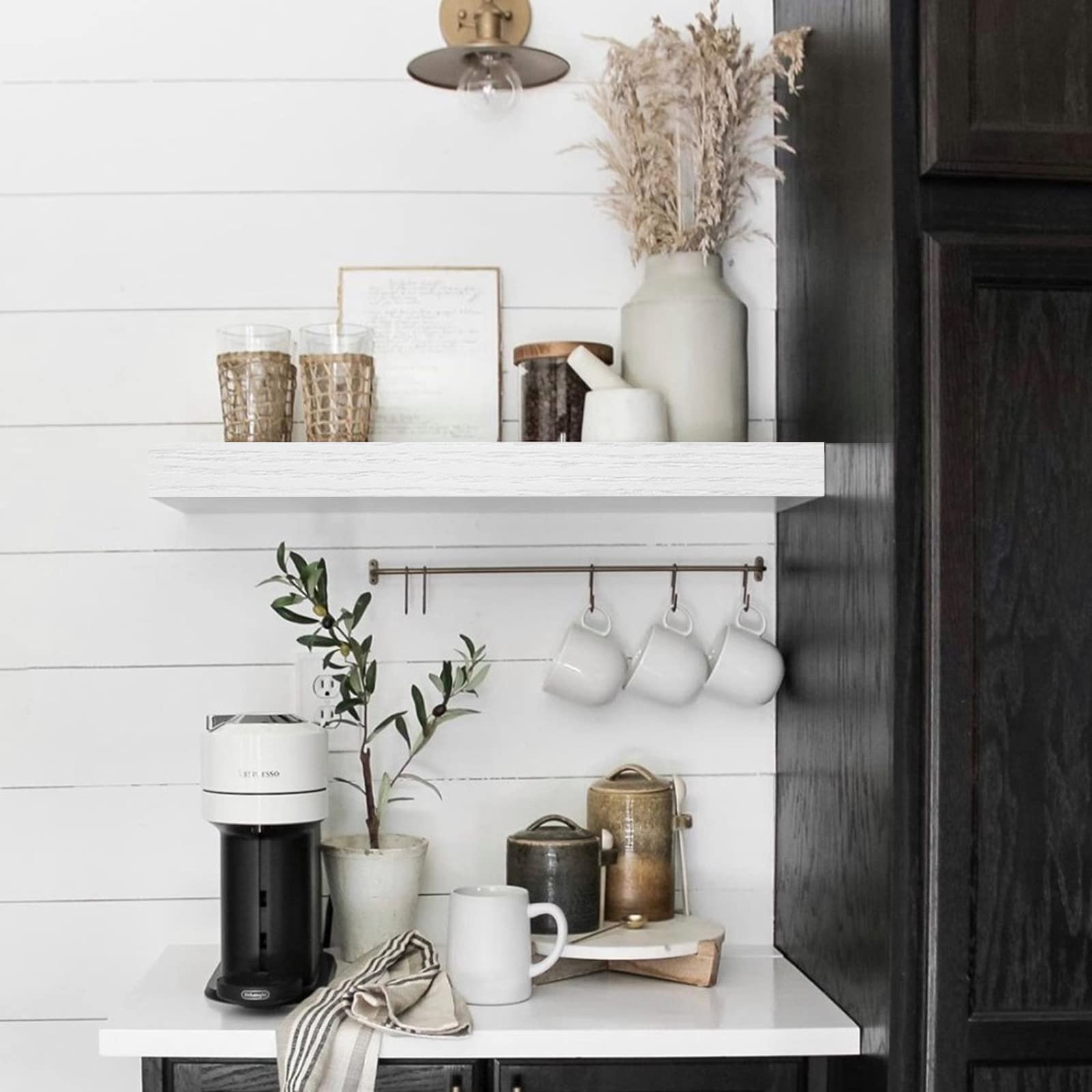 QEEIG bathroom setup with towel basket and plant display