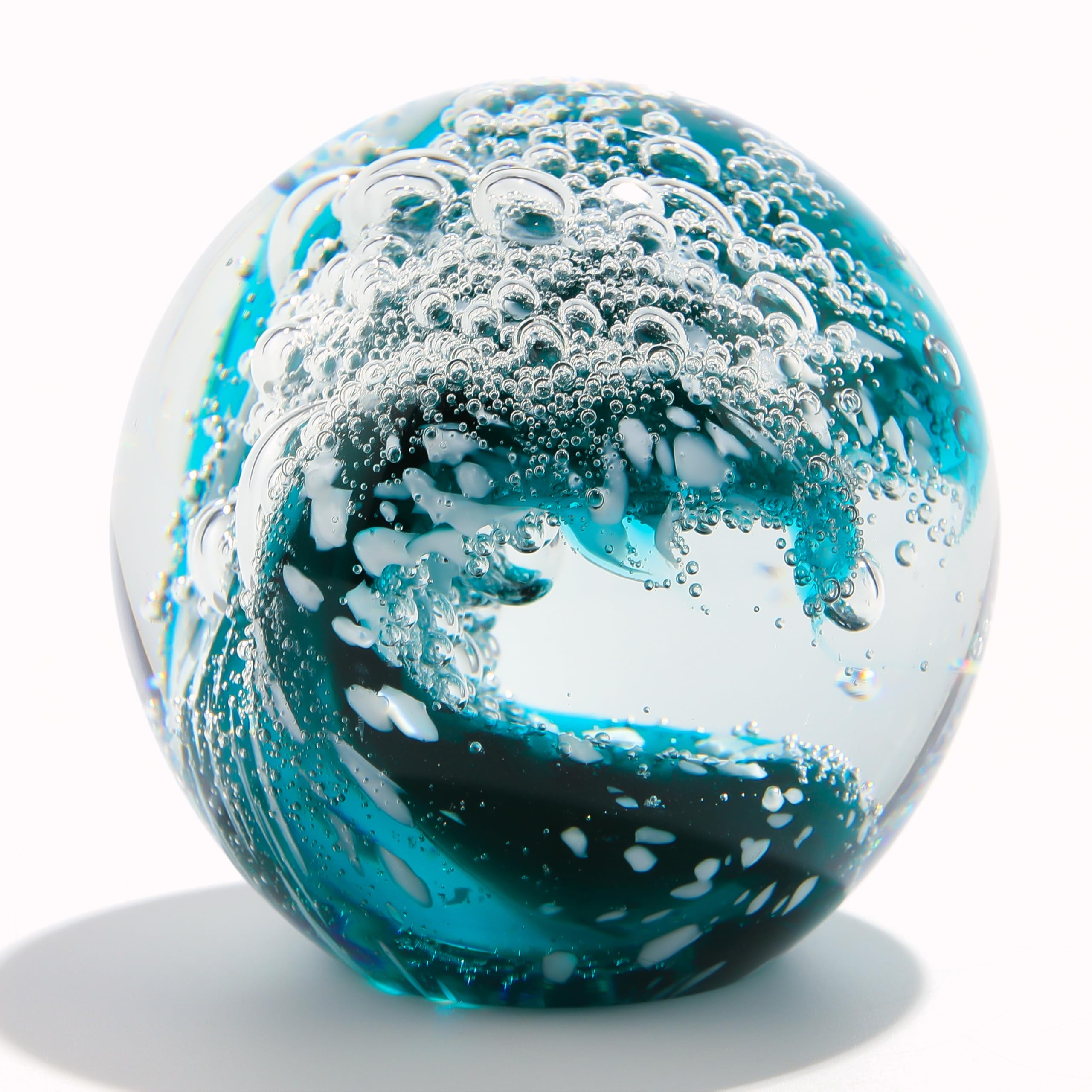 Qianwei Ocean Waves crystal ball with vivid waves for elegant desk decor.