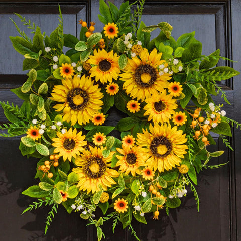 Qiexuxing sunflower wreath on the front door adds bright spring curb appeal.