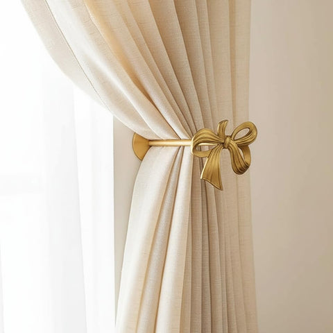 QIIODATD brass curtain holdbacks bow add subtle luxury and secure drapery.