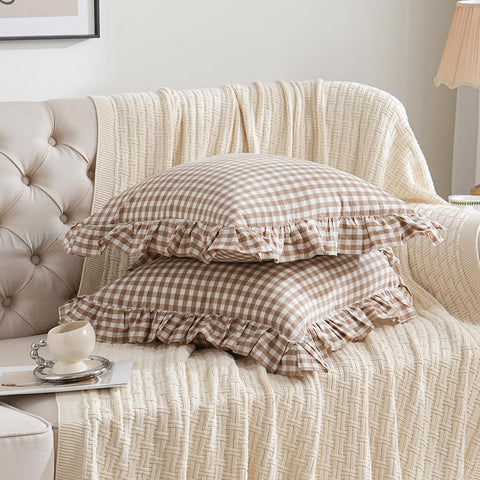 Qilunn taupe-brown plaid pillow cover with ruffles close-up.