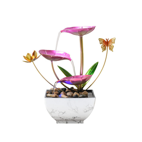 QINGYINGGE pink 11h tabletop fountain on a desk providing calming ambience