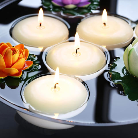 qinxiang ivory floating candle on wedding table adds warm ambiance
